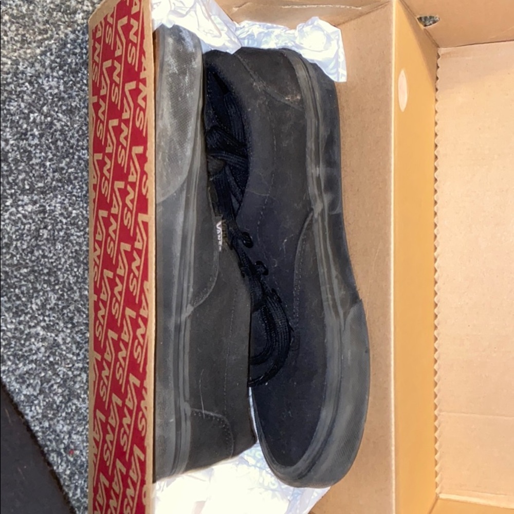 All black low rise vans